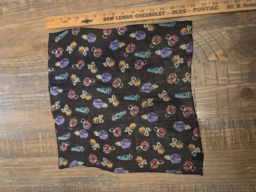 Elizabeth Taylor's Passion Nylon Scarf adorned with perfume bottles